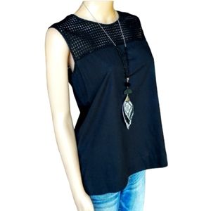 Valerie Stevens Sleeveless Top With Cut Out Design